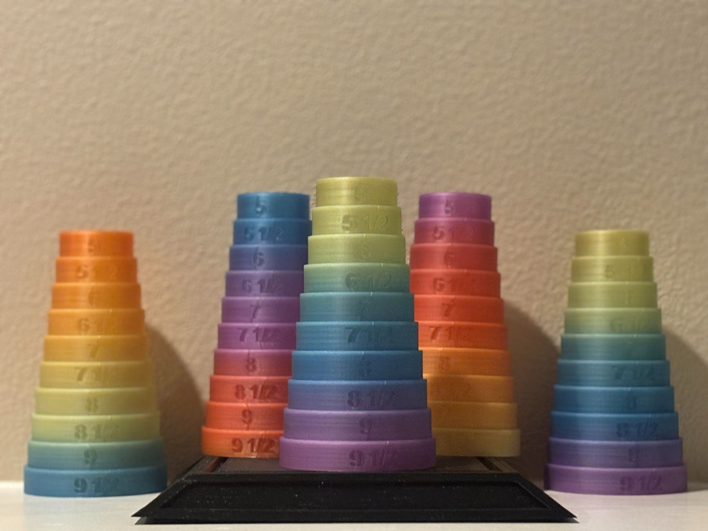 One of a kind unique pattern rainbow bracelet sizer mandrels. Tapered cones ranging from size 5-9.5, each with a one-of-a-kind color pattern. jewelry making tool for accurate wrist measurement. Limited edition set for sizing bangles and bracelets.