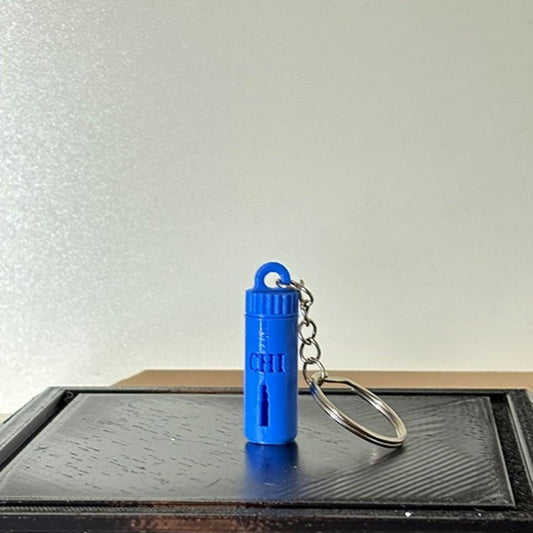 A pill bottle keychain filled with small silver star shapes, labeled with &quot;Chicago Chi Town&quot; in black text, shown against a white background, made in the USA and representing a Chicago-themed party accessory.