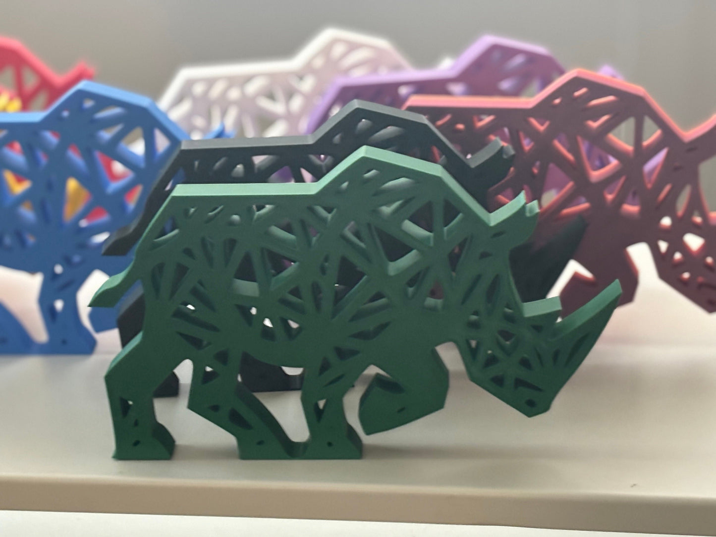 Large geometric rhino figure jungle green